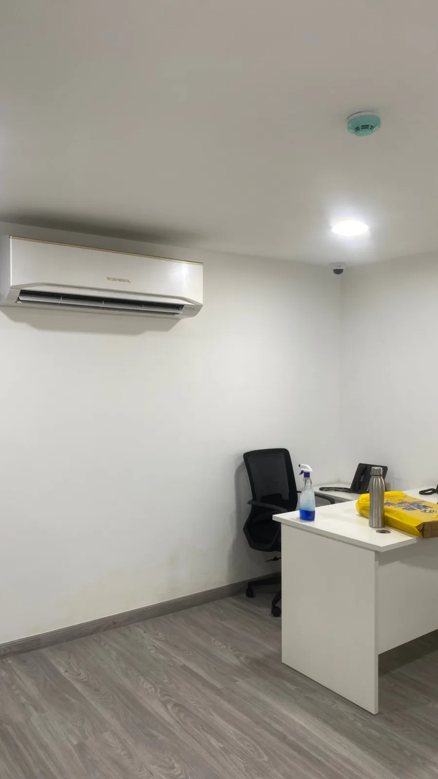 Office interior with wall finishes and flooring.