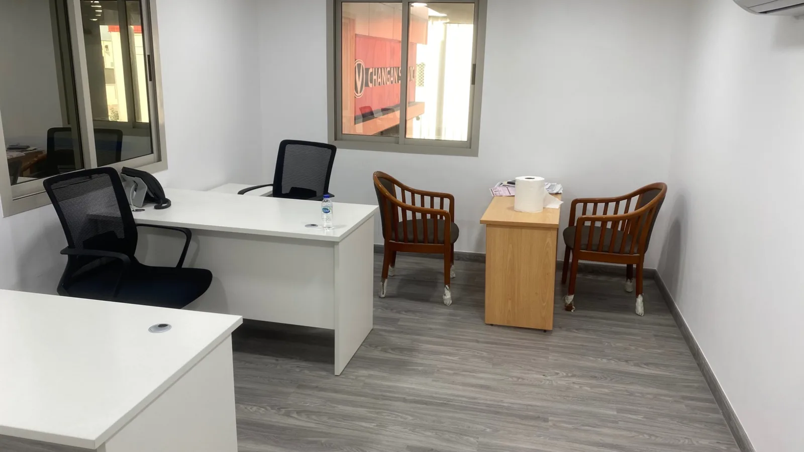 Office desks and seating within the facility.