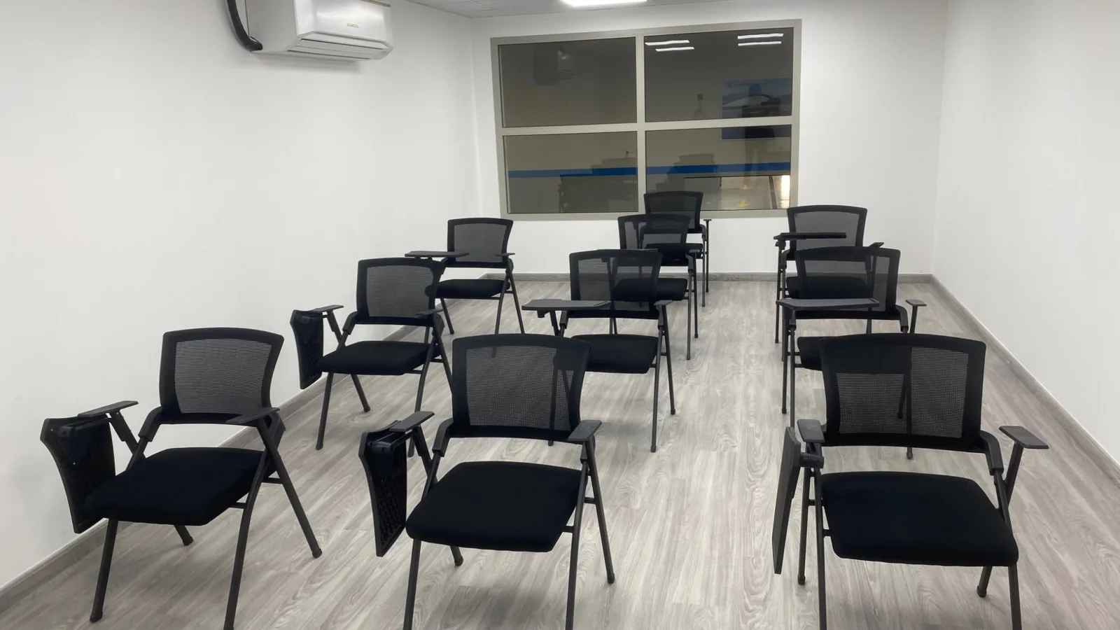Rows of seating in the training and briefing room.