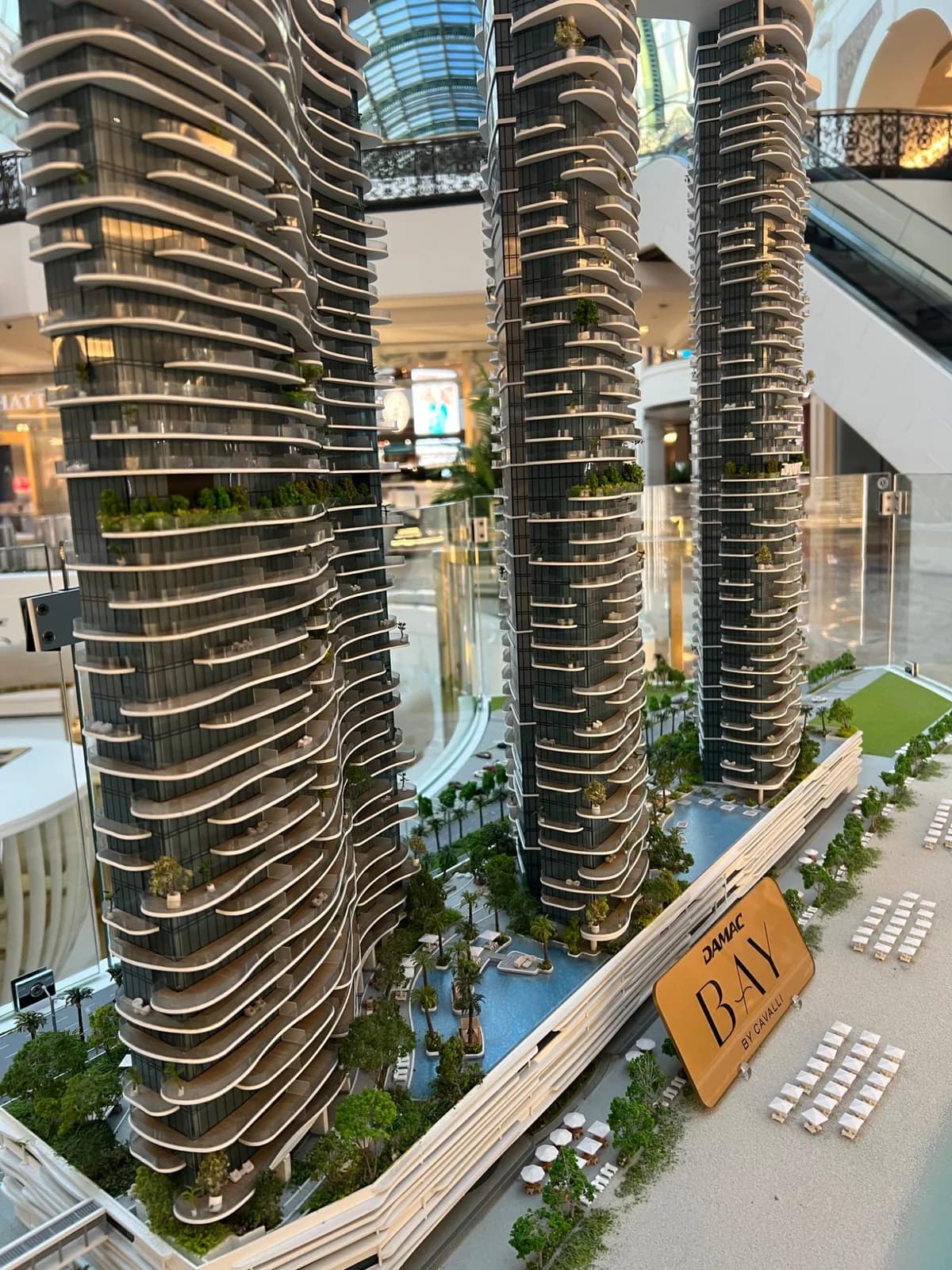 Diagonal view along the tower group in the DAMAC BAY architectural display.