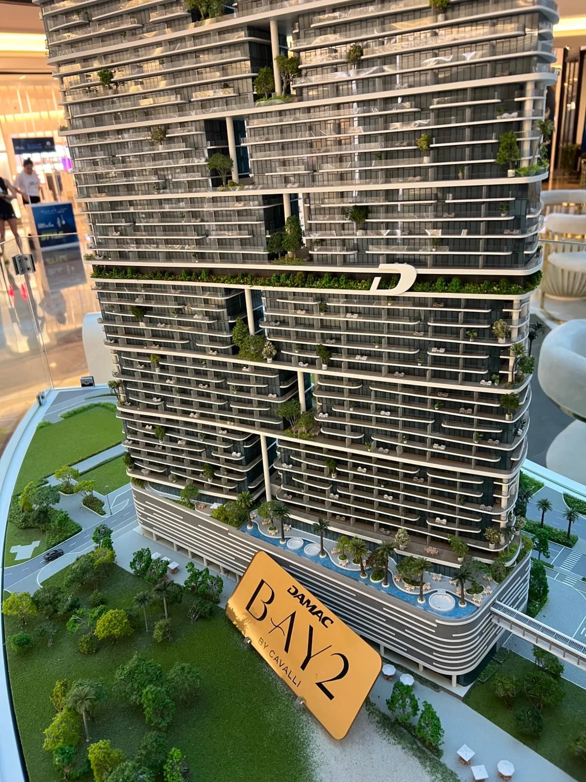 Angled view of the DAMAC BAY 2 model and its project-name plaque.